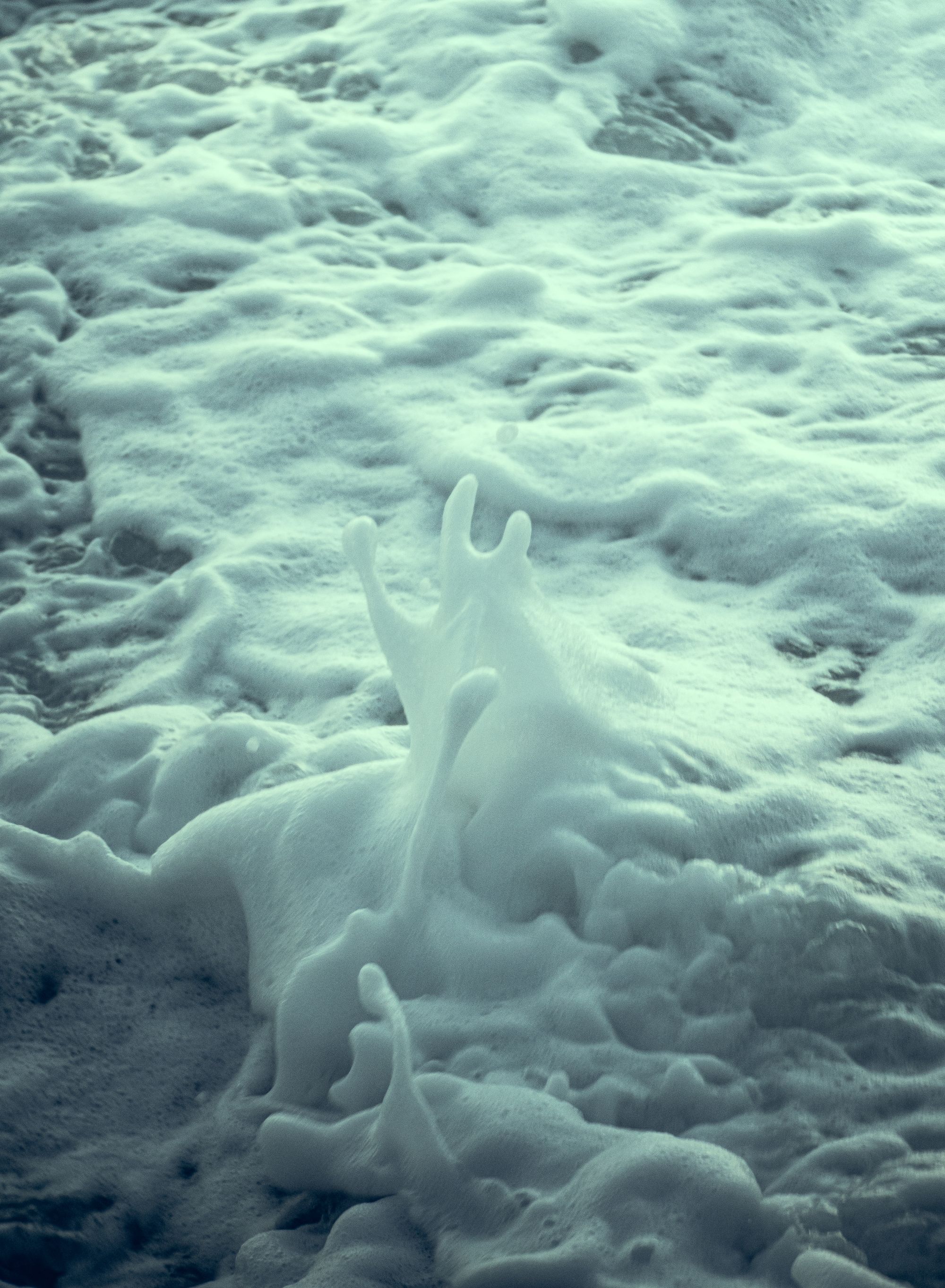 Sea foam forming a porous pattern