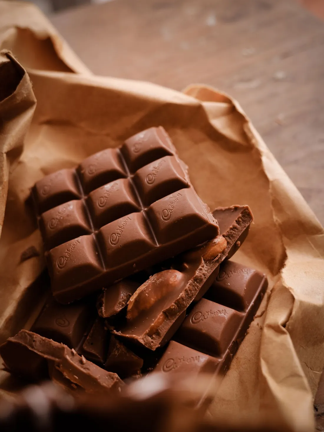Close-up photo of chocolates on rustic paper