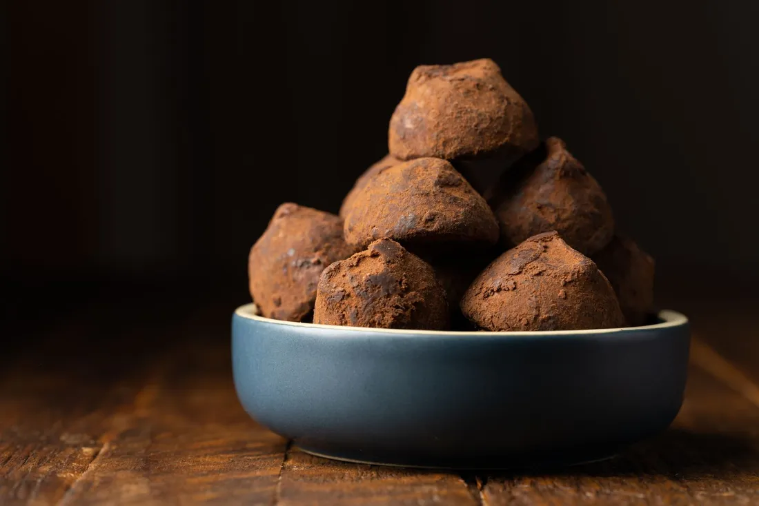 Photo of a bowl with chocolate truffles