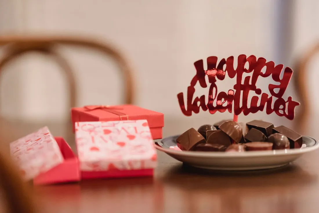 Small gift boxes with chocolates on a table