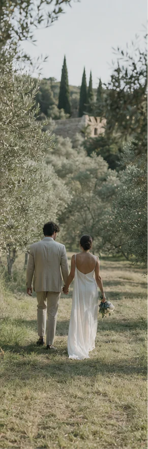 Illustrative couple walking away through an olive grove