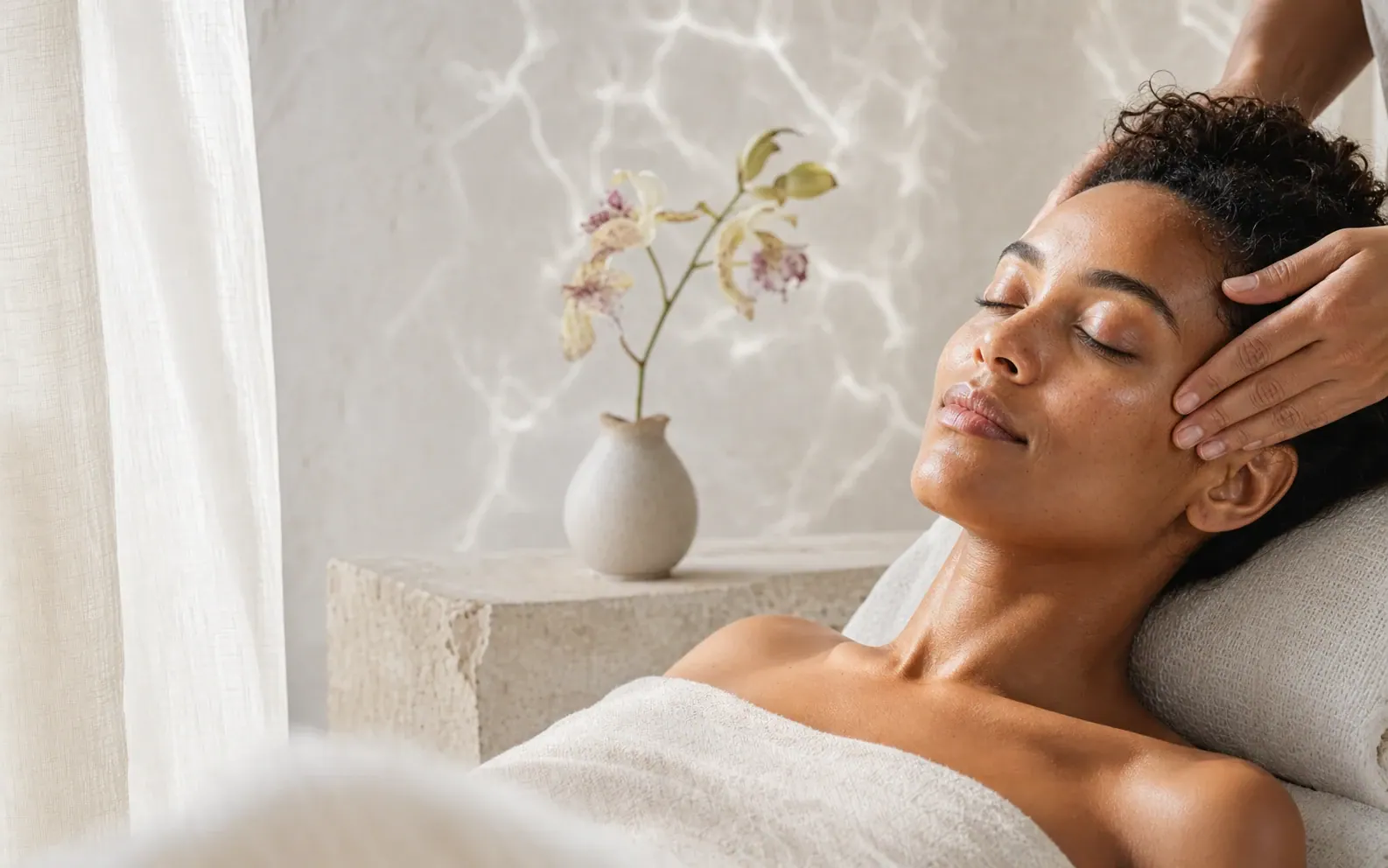 Client relaxing during a professional facial ritual