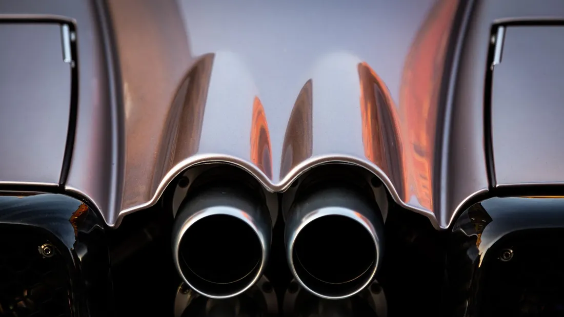 Close-up of a dual-tip performance exhaust on a sports car