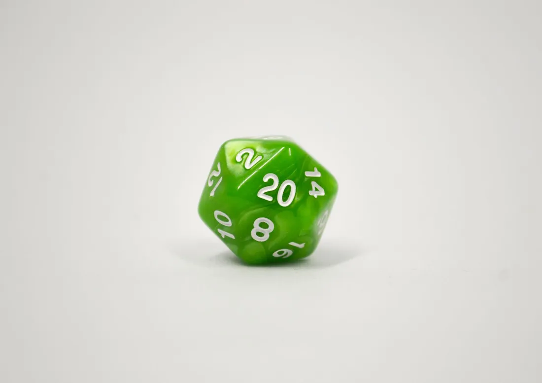Green twenty-sided die used for tabletop games