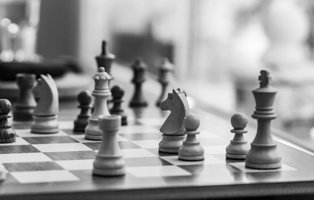 Close-up of a chessboard with pieces in play