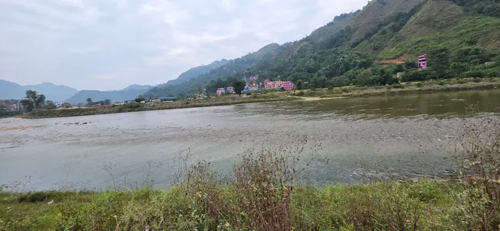 The river below the homestay — view 1