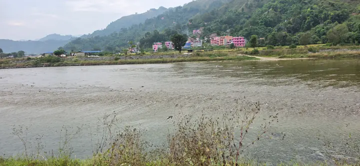 The river below the homestay — view 2