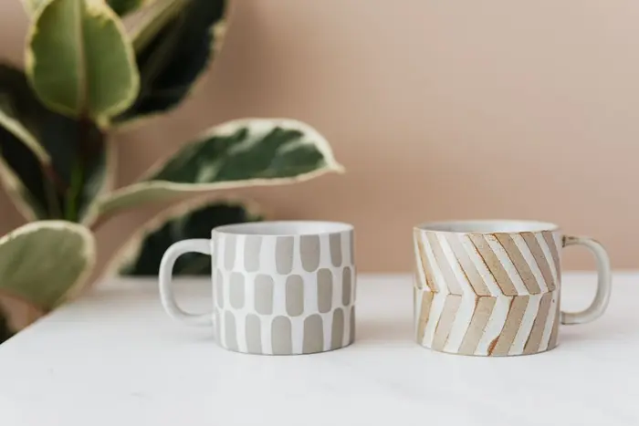 Finished ceramic cups set out on a table