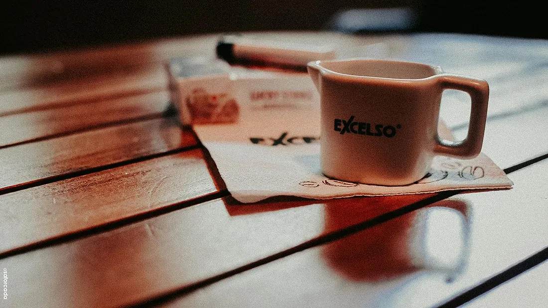 A white ceramic mug on a table
