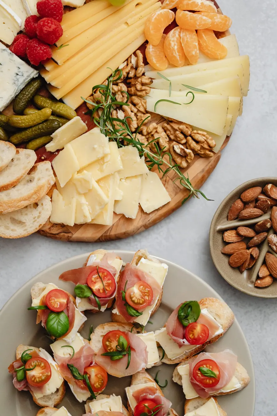 An assorted spread on a ceramic serving plate