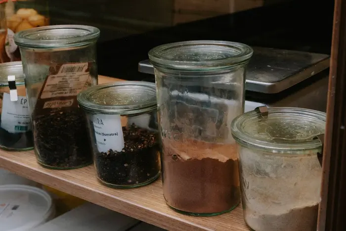 Jarred spices used in PLUME's oriental family