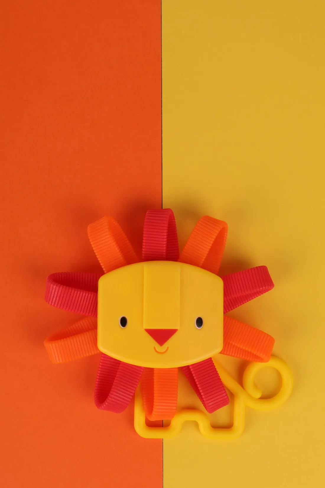 A lion-shaped toy resting on a table
