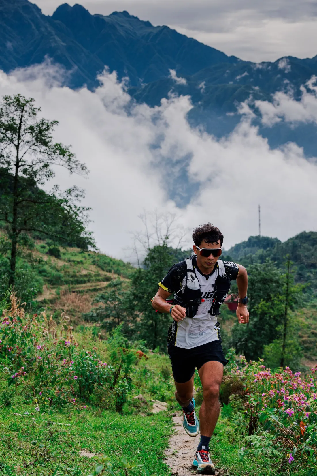 Trail runner navigating a mountainous landscape