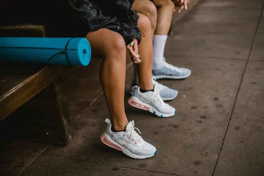 Two people wearing casual sneakers