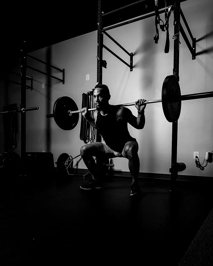 A member under the bar in the rack, mid-set