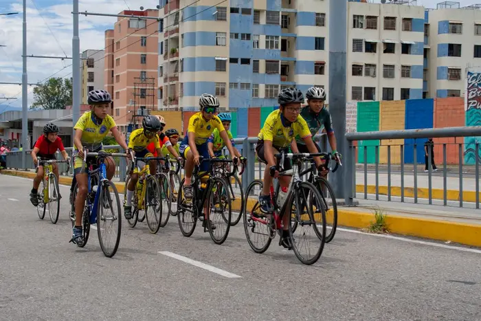 A group of cyclists riding together