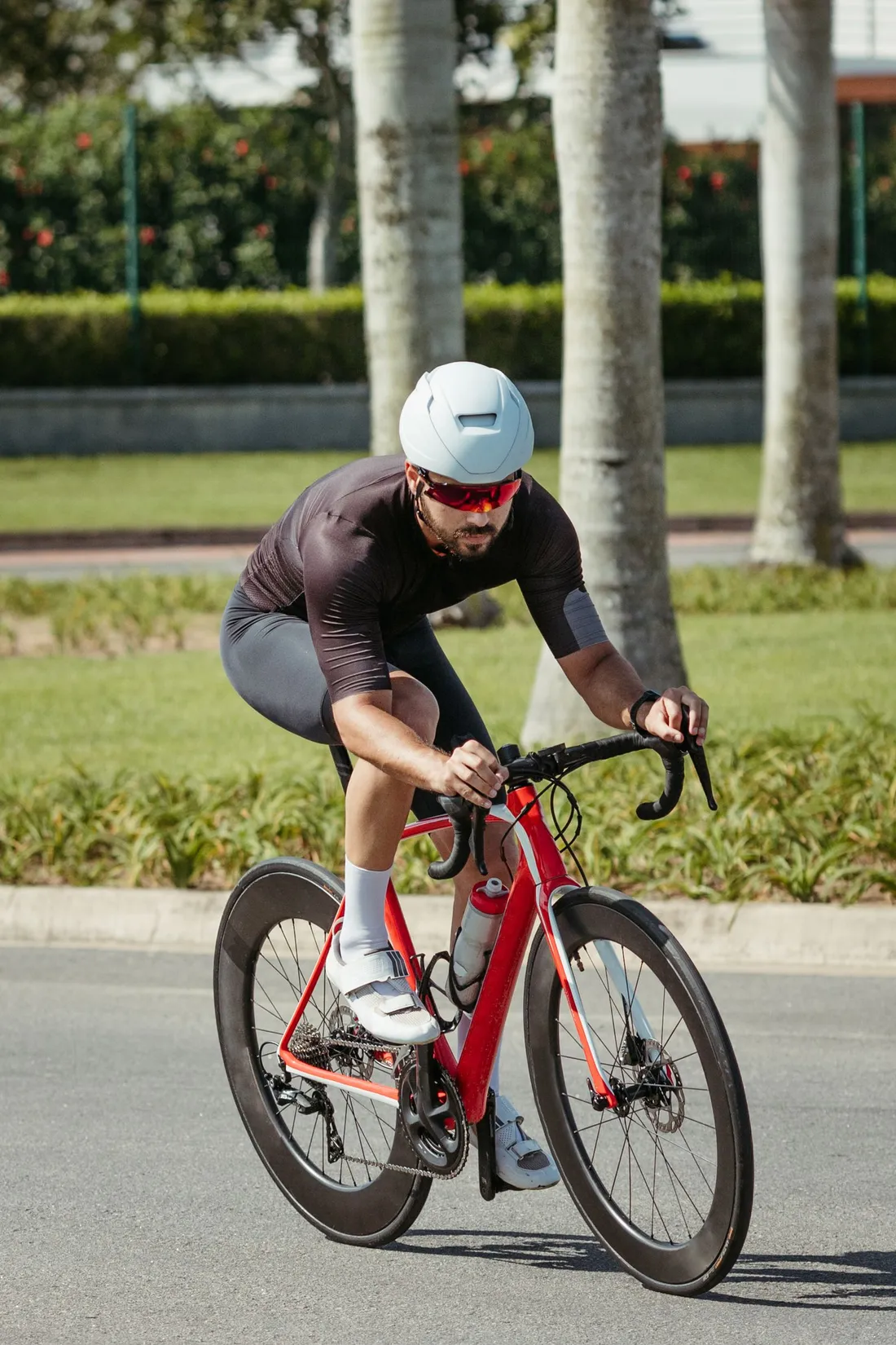 Cyclist riding a race bike on a road