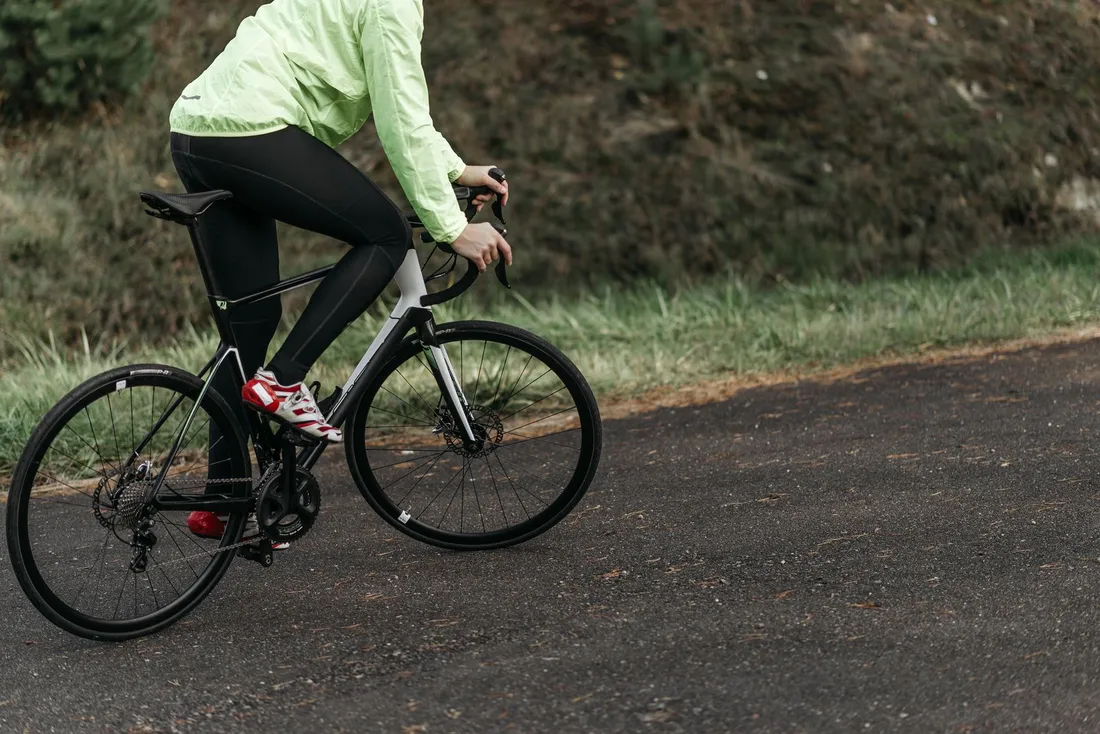 Cyclist riding a carbon road bike