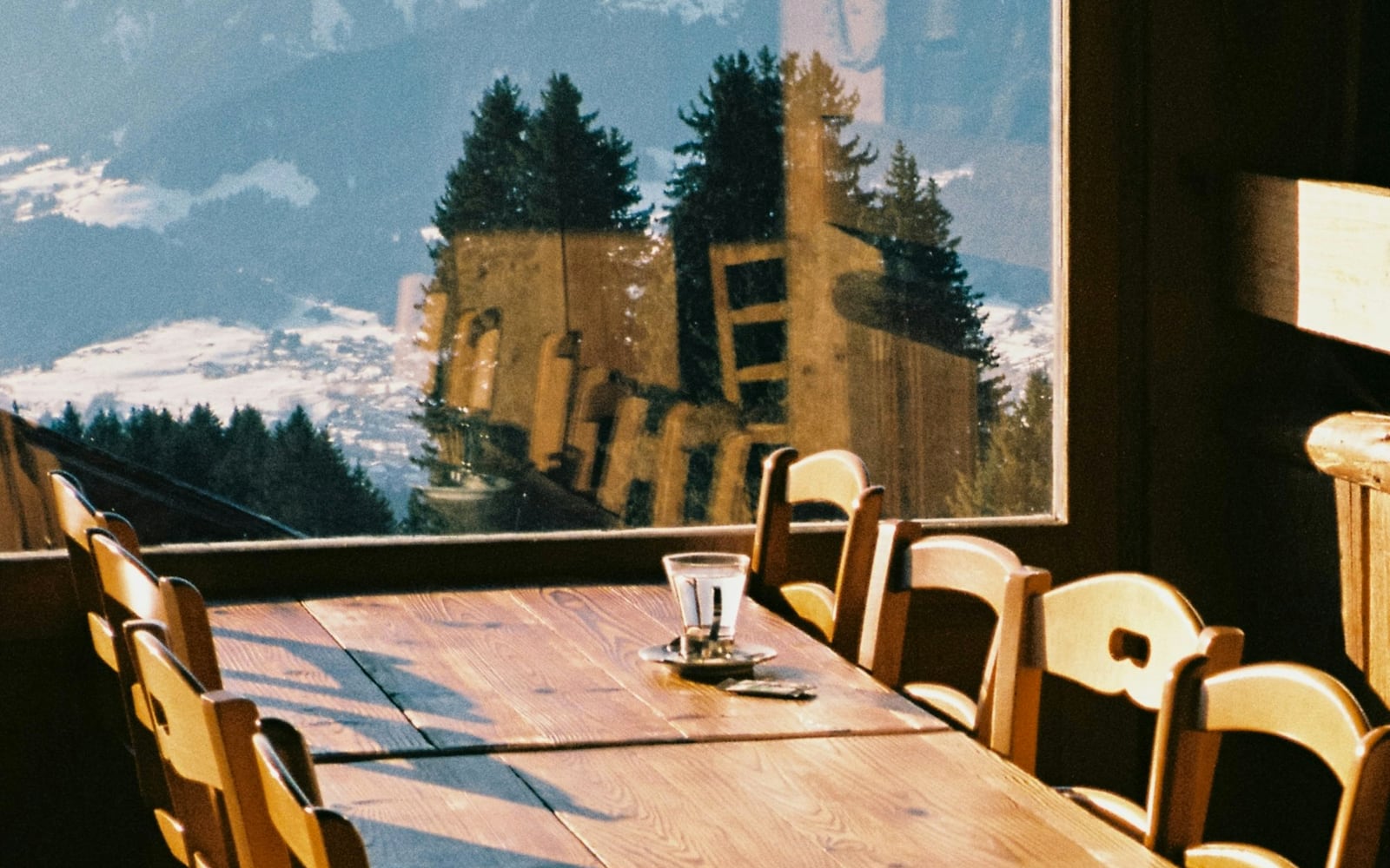 The Terrace Grill in summer: long tables on the south terrace above the valley
