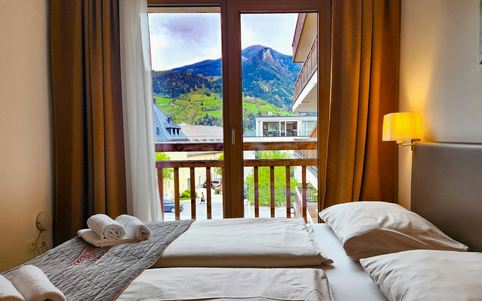 View from the Corner Sky Suite: a private terrace over the east ridge with first light on the summits