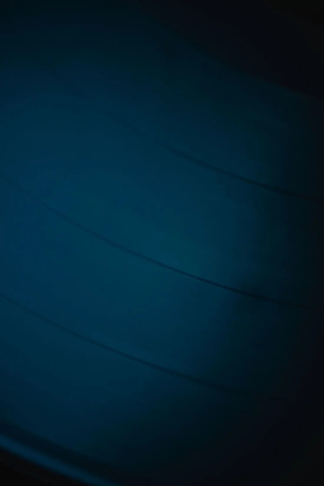Abstract close-up of a blue vinyl record
