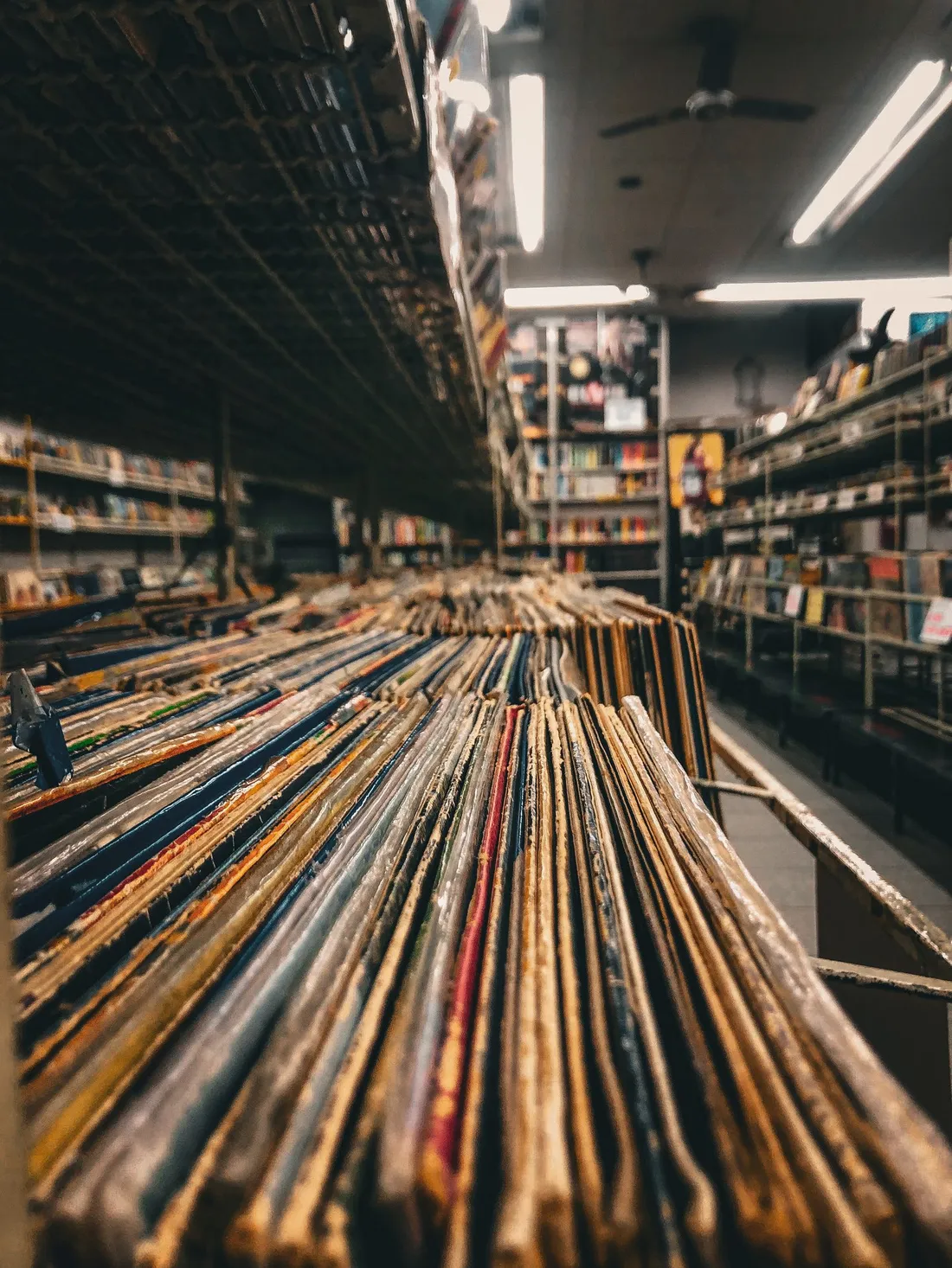 A record store with many vinyl records stacked on shelves