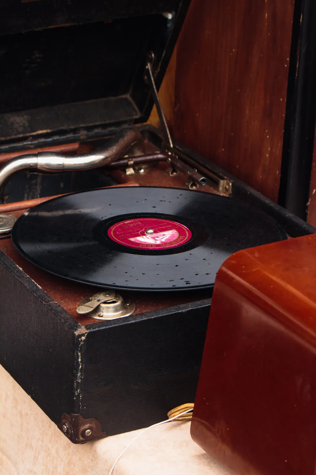 A record spinning inside a vinyl player